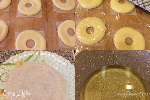 Заготовки пончиков накрыть и оставить в теплом месте на 30–40 минут. В миске смешать сахар и корицу для посыпки (сахар лучше брать мелкий). Спустя указанное время, в сотейник налить масло и хорошо подогреть.