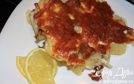 Рецепт Рыба с картофелем, запеченные под сметаной и сливками